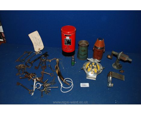 A quantity of miscellanea including an AA badge, a quantity of keys, pencil sharpener, leather cased hip flask and stirrup cu