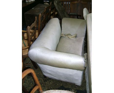 A small Chesterfield style drop-end Sofa, having fixed and drop-end arms, in need of restoration, on turned legs