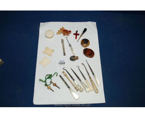 Miscellaneous mother-of-pearl handled ladies Tools, button hooks etc., Ivory thread spools, agate fish, etc., Ivory ointment 