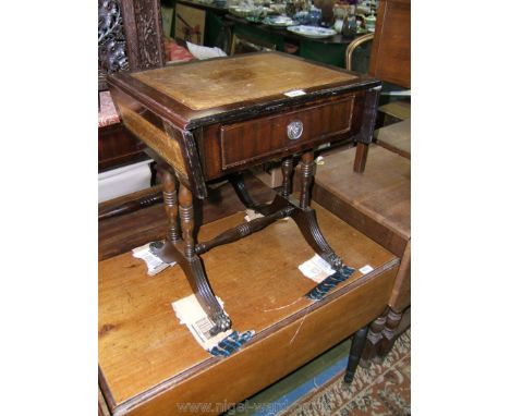 A reproduction Georgian style small Sofa Table, rectangular top with tooled leather insert, with two similar drop leaves, on 