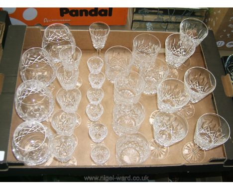 A quantity of Waterford crystal glasses including six wine, six sherry, six whiskey, six liqueur and six brandy
