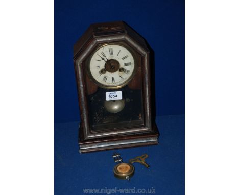 A late 19th c. Pine cased Mantle Clock, cut corners to the top of the case, circular white Roman numeral face marked 'J' in b