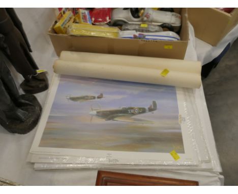 Quantity of vintage Spitfire and military plane prints and rolled posters