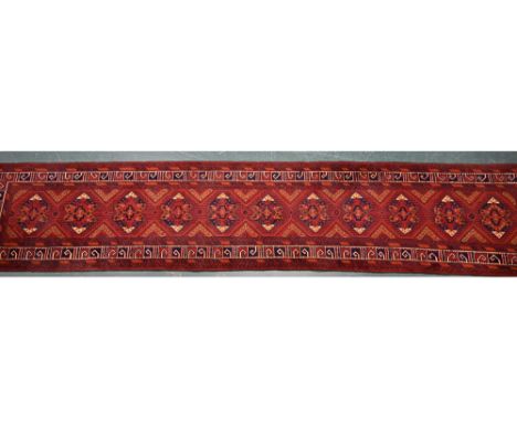Alpaca runner, centre rectangular panel with repeating design and with multiple line border, principal colours beige, blue an