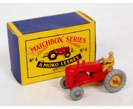 Matchbox Regular Wheels No.4B Massey Harris Tractor, red body, gold trim to rear wheels only, light tan figure driver, in the