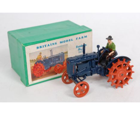 Britains 127F, Fordson Major tractor with driver, dark blue body and fitted with orange studded metal wheels, with driver, or
