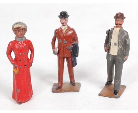 Britains Civilian Figure Group, 3 examples to include Edwardian Woman in red dress (G), Man walking with Pipe, in grey with b