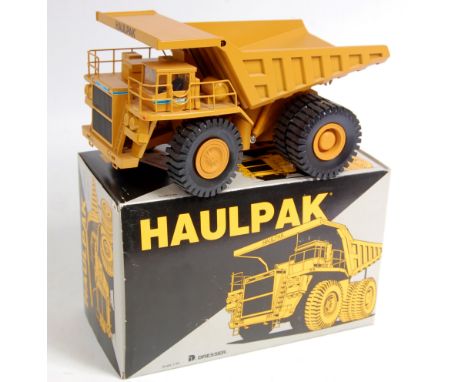 Conrad No.2721 1/50th scale diecast model of a Dresser Haulpak 830E Mining Truck, finished in yellow with black tyres, in the