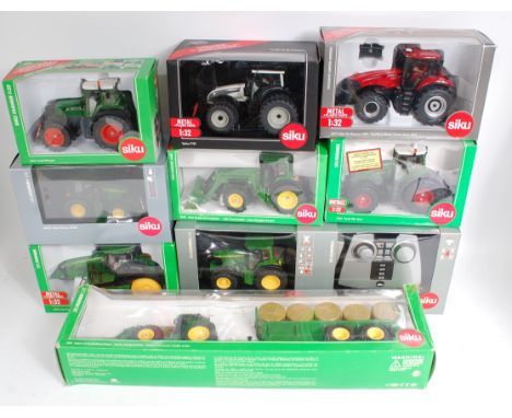 Siku 1/32nd scale remote control and scale model tractor group, 9 boxed examples, some boxes with window damage, specific exa