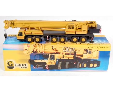 Conrad No.2091 1/50th scale diecast model of a Grove GMK 6250, 250T 6-Axle Crane, foinished in yellow and black with Grove Li