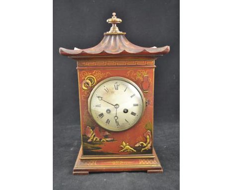 A 19th century lacquered pagoda mantle clock, two train movement, striking on gong, back plate inscribed Vincent & Cie, 61274