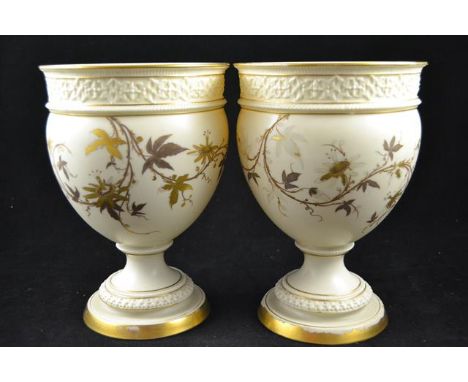 A pair of gilt decorated Royal Worcester ivory ground vases, foliate decoration, puce mark to base - H23cmCONDITION REPORTwea