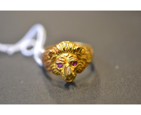 A 22ct gold 'lions head' ring set with ruby eyes, size Z - approx gross weight 18.5gCONDITION REPORTGood condition, ring does