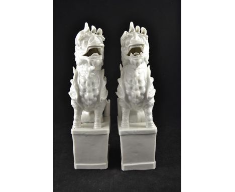 Two Chinese blanc de chine kylin incense stick holders - H35cmCONDITION REPORTdamage to both tails, damage to one incense hol