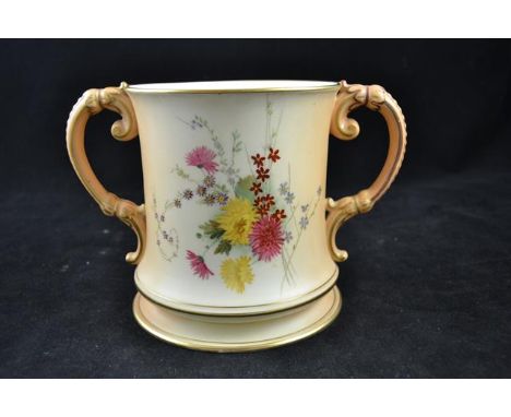 A Royal Worcester blush ivory loving cup decorated with flowers, date mark for 1906, puce mark - H15cm