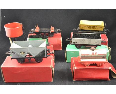 Seven Hornby O gauge wagons etc - water reservoir, hopper wagon, Shell petrol tank wagon, no.1 side tipping wagon 'McApline',