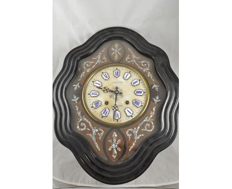 A late 19th/early 20th century French comptoise style wall clock, 23cm dial with enamel numerals, eight day movement, interio