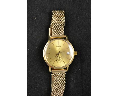 An Omega yellow metal gentleman's wristwatch on 9ct gold mesh bracelet, presented by the State of QatarCONDITION REPORTgoing 