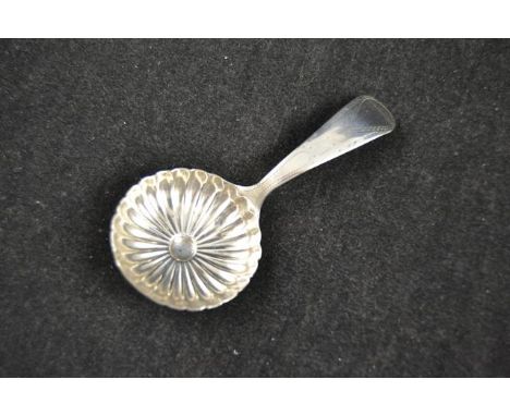 A late Georgian caddy spoon with embossed bowl, Birmingham 1799, maker Joseph TaylorCONDITION REPORTgood condition