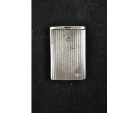 An engine turned silver vesta case with sliding compartment, import marks London 1924, George Stockwell - H6cm