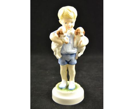 A Royal Worcester figure - Monday's child is fair of face, depicting a boy with two dogs, 3519 - H18cmCONDITION REPORTgood co