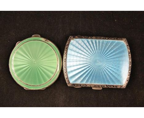 A silver cigarette case with blue guilloche enamel decoration, Birmingham 1925, together with a silver and guilloche enamel c