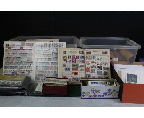A large collection of British and world stamps, contained within albums together with loose examples and first day covers...e