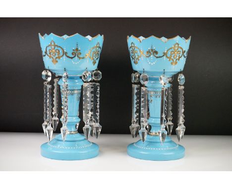 Pair of 19th century Bohemian blue glass lustres with hanging crystal droplets, with gilt and white enamel decoration, 29cm h