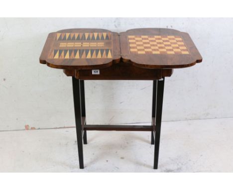 19th century Burr Walnut Games Table, the swivel fold over top opening to a chess board and a backgammon board with cribbage 