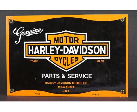 A Harley Davidson Parts &amp; Service enamel sign with four mounting holes, measures approx 30.5cm x 20.5cm 