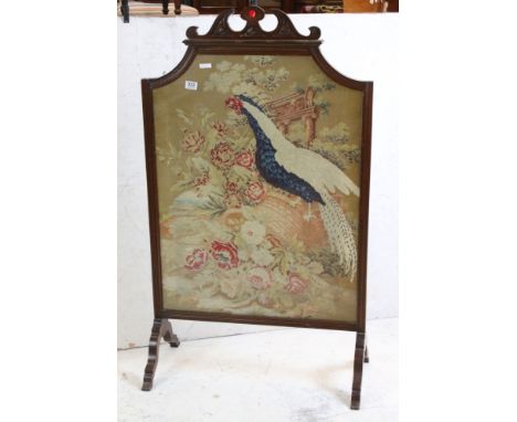 Large Mahogany Framed Firescreen inset with a needlework panel depicting a pheasant stood on a basket of flowers, 74cm wide x