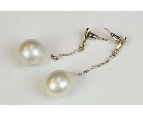 Pair of baroque pearl drop earrings with silver mounts 