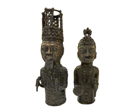 A pair of Benin type bronze figures of king and queen, height of king 37cm.