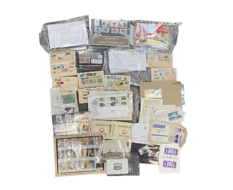 A box of GB stamps, presentation packs, stamp booklets and a few cards of Commonwealth stamps.