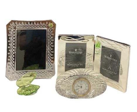 WATERFORD; a cased crystal glass picture frame, 26 x 21cm, a cased folding picture frame, a green glass butterfly paperweight