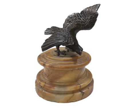 A bronze model of an eagle, on siena marble base, height 12cm.