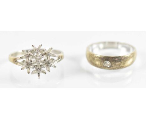A 9ct yellow gold flower ring set with small white stones, size W, and a 9ct yellow gold white stone set ring, size S, combin