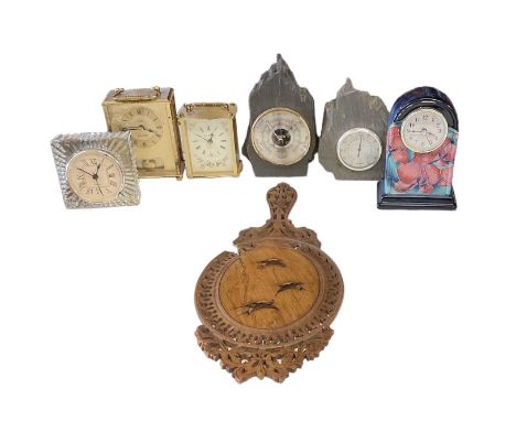 Two modern brass cased carriage clock type timepieces, height of largest 13.5cm, a cut glass timepiece, 10.5 x 10.5cm, an Old