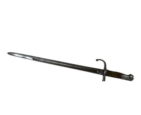 An Islamic bayonet, lacking scabbard, length of blade 45.5cm, overall length 58cm.