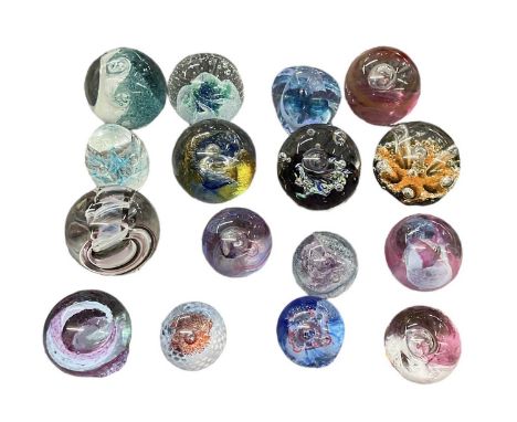 CAITHNESS; a group of sixteen colourful glass paperweights including 'Sea Dance', 'Cosmos', 'Tidal Wave', 'Ribbons', etc.