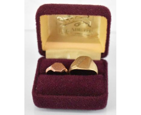 A 9ct yellow gold signet ring, size U, and a further 9ct yellow gold signet ring, size J, combined approx 8.3g (2).