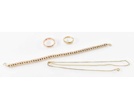 A 9ct yellow gold red stone set bracelet, length 17cm, a 9ct yellow gold fine link necklace, a 9ct yellow gold wedding band, 