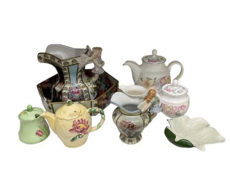 CARLTON WARE; a 'Fairy' lustre hexagonal wash bowl and jug, with matching smaller jug, yellow ground floral teapot, green flo