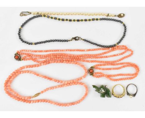 A coral bead necklace with 14ct yellow gold clasp, length approx 60cm, a two strand 925 silver mounted coral necklace and mat