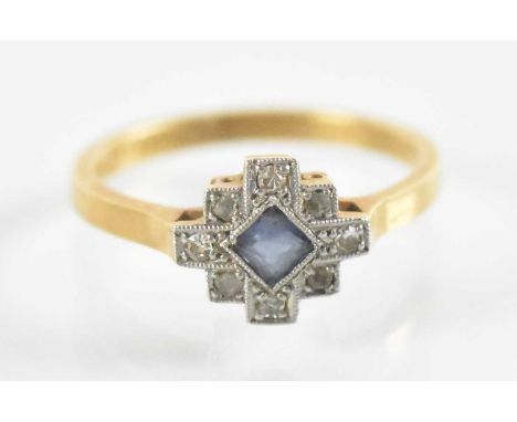 An 18ct yellow gold and platinum blue and white stone set ring, size M, approx 2.8g.
