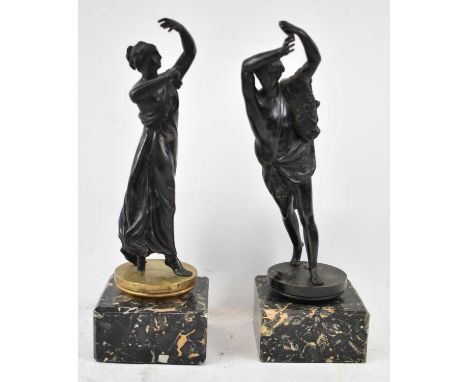 A pair of late 19th/early 20th century bronze figures, male and female, on marble plinth bases, height 36cm.