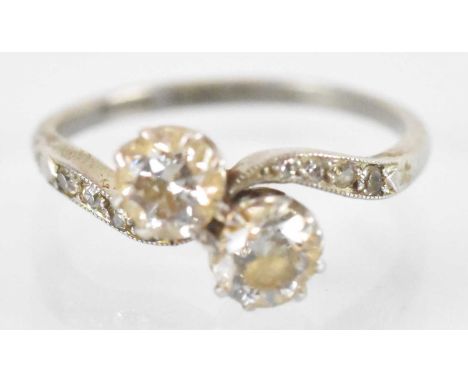 A platinum diamond crossover ring set with two diamonds, each approx. 0.4ct, total diamond weight approx. 0.8ct, size N, appr