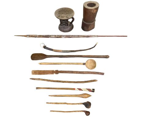 Three African knobkerries, a club with painted decoration and spear, length of largest 94cm, a large African spoon, two stirr