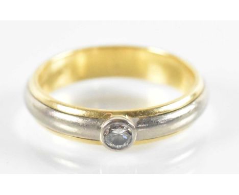 An 18ct yellow and white gold single white stone set ring, size 3, approx 12.2g.