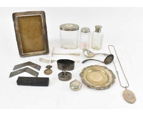 GREEN &amp; CADBURY LTD; a George V hallmarked silver photograph frame, Birmingham 1918, 15 x 10cm, a Birmingham hallmarked s